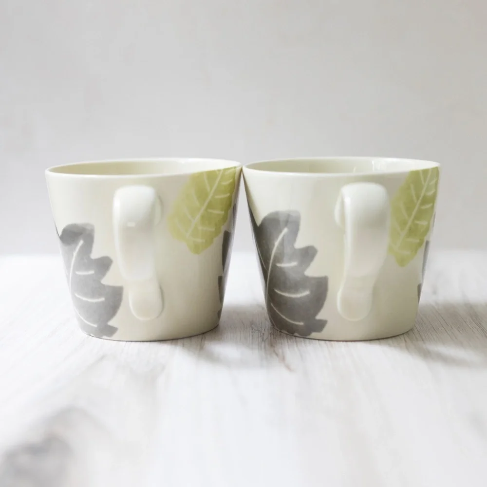 Set of 2 Crate and Barrel leaf mugs Barbara Eigen green gray brown 10 oz 3.25